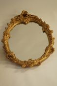 A ornate gilt mirror