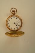 A.W.W Co, a gilt metal Hunter pocketwatch, the white enamel dial with black hands, Roman Numerals