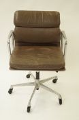 A Charles Eames soft pad leather office chair, Herman Miller label to the base
