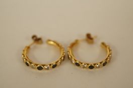 A pair of sapphire and cubic zirconia hoops 18ct gold earrings by Le Gi of Vicenza, Italy,