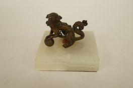 Chinese Dog of Fo finial on a marble base