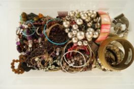 A quantity of assorted costume jewellery including various beads, stained bone and a Buckingham
