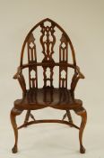 A reproduction Gothic style armchair