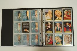 An album of SportTime Marylin Monroe and Barbwire trade cards