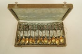 A set of twelve parcel gilt tea / coffee spoons, by Bruckmann and Sohne, Germany, 800 standard,