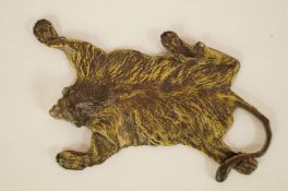 A Bergman style cold painted bronze of a Lion skin carpet, stamped with B and impressed Austria