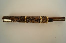 A Chinese buffalo horn chopstick case finely carved