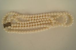 A three row uniform cultured pearl necklace , the 44/48/54 pearls of approximately 8.3mm to 9.2mm