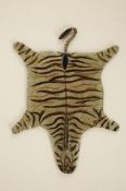A Bergman style cold painted bronze of a Zebra skin carpet, stamped with B and impressed Austria
