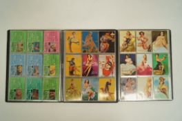 Two albums of adult collectors cards, 1950s