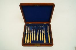 A part set of close plate fruit knives and forks with ivory handles, five of each and eight butter