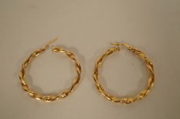 A pair of hoop earrings stamped "375" of barley twist design, 3.5cm  diameter 2.3 grams