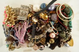 A quantity of assorted costume jewellery including a Kramer brooch and a lady's wrist watch