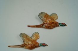 Two Beswick ceramic flying ducks