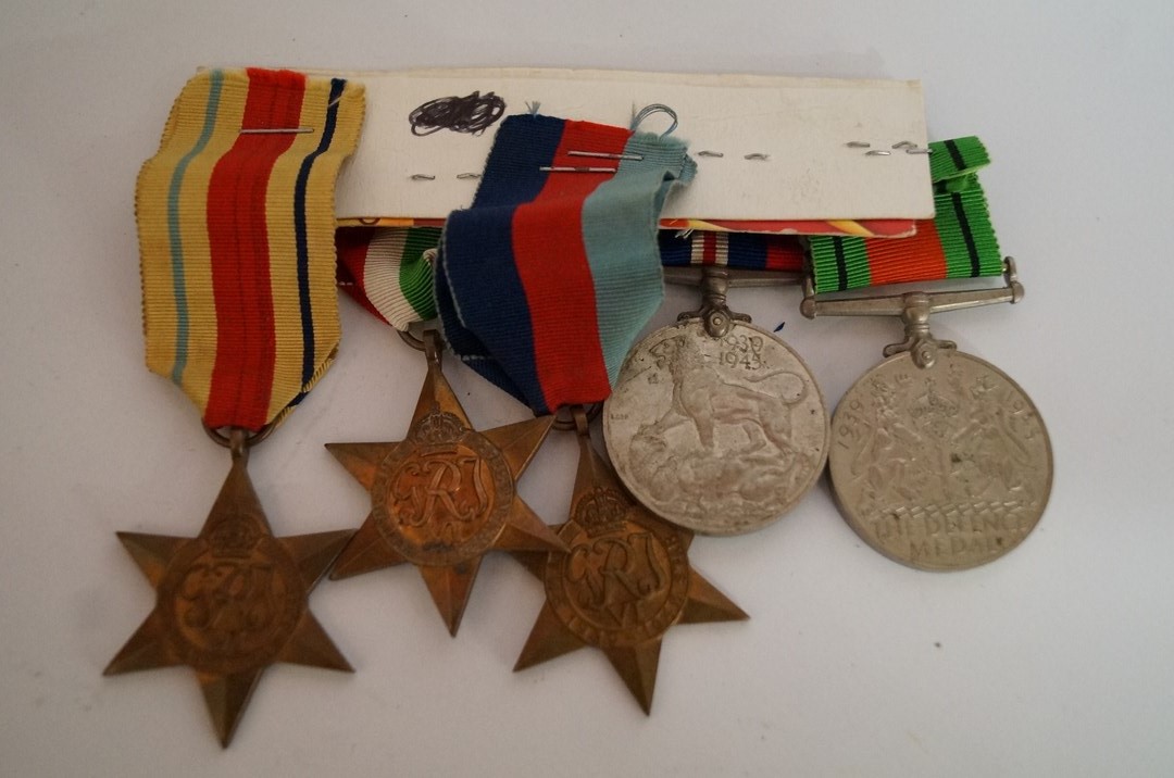 Africa star, France and Germany star, 1939-45 star, war medal and defence medal, all unnamed