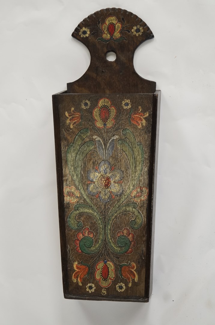 A Norwegian style 'Rosemaling' hand painted wall hanging candle box, executed by Margaret Haworth-