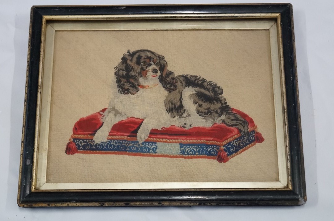 A Victorian framed tapestry of a King Charles spaniel