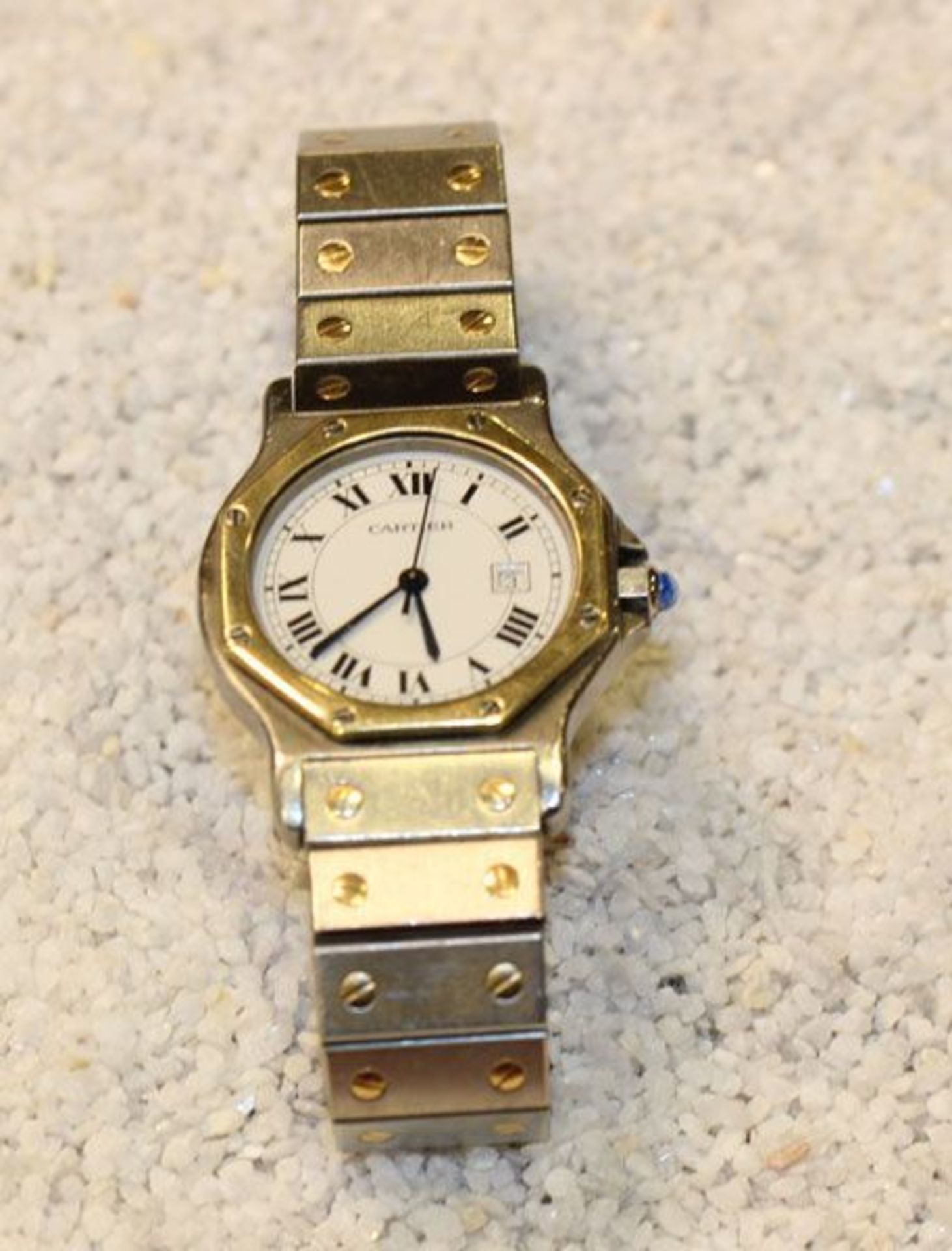 Cartier Damenarmbanduhr, Santos, Edelstahl/750 Gold, rundes Uhrengehäuse mit aufgeschraubter