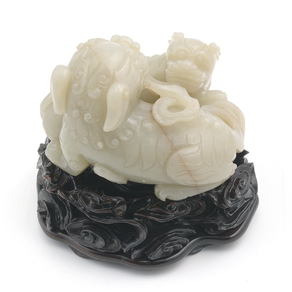 A Jade Buddhist Lion Group Portraying an adult playfully contending for a ribbon or tuft of smoke - Image 3 of 5