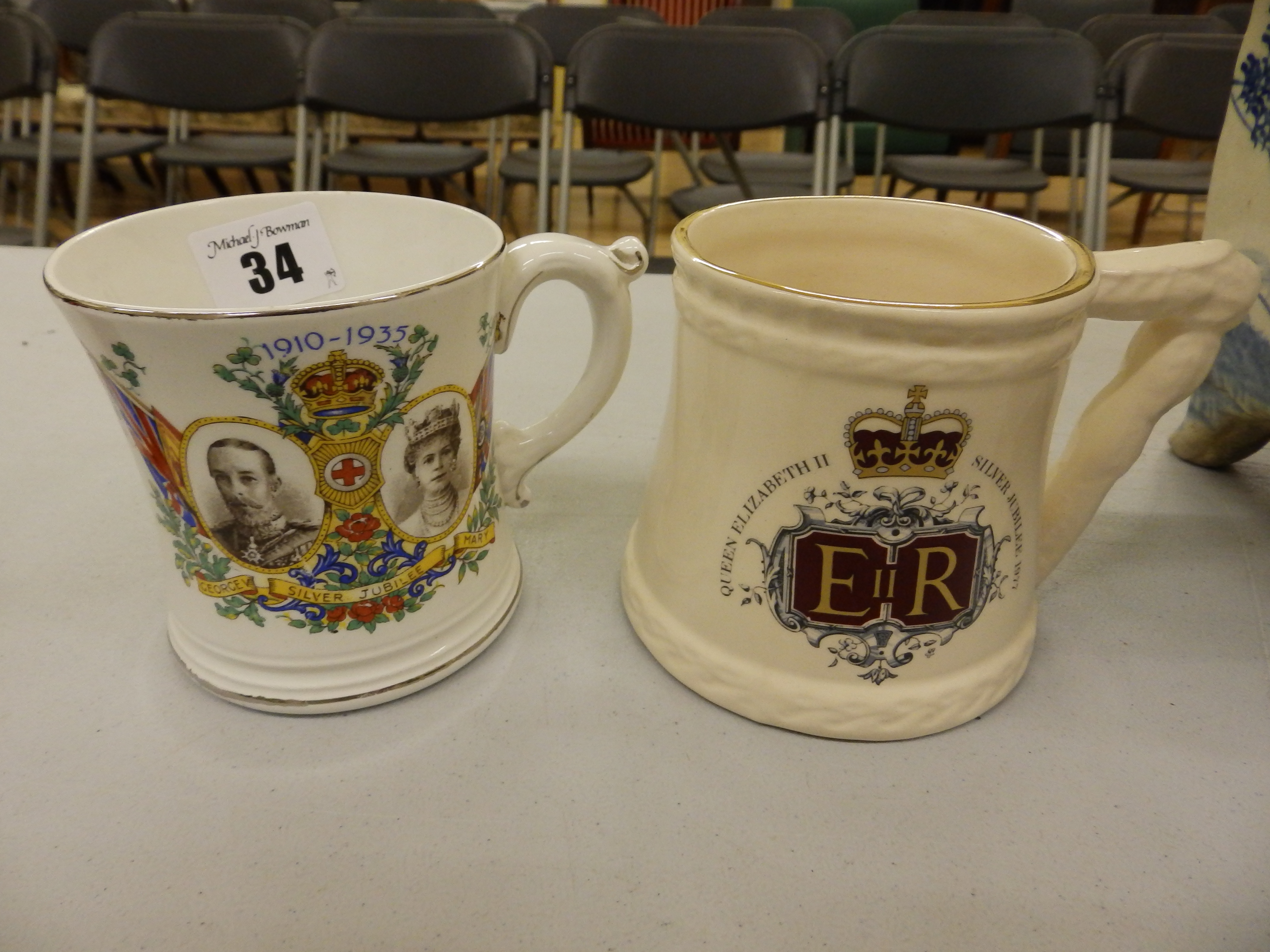 A Bovey Pottery 1935 Coronation mug - `Chudleigh` and one other (2)