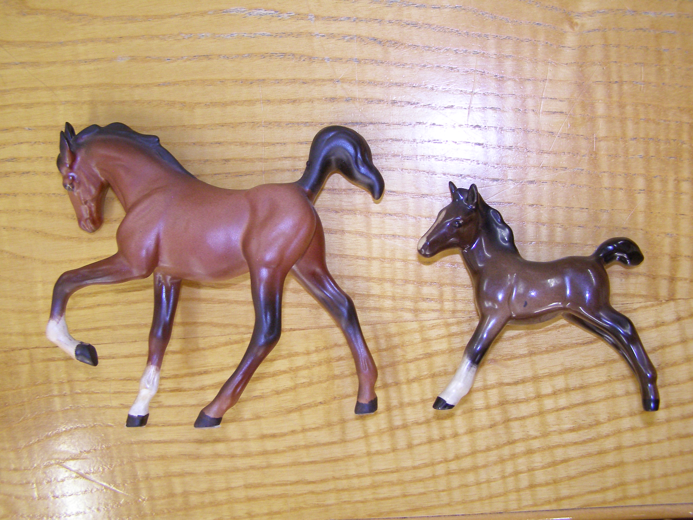 Two small Beswick foals