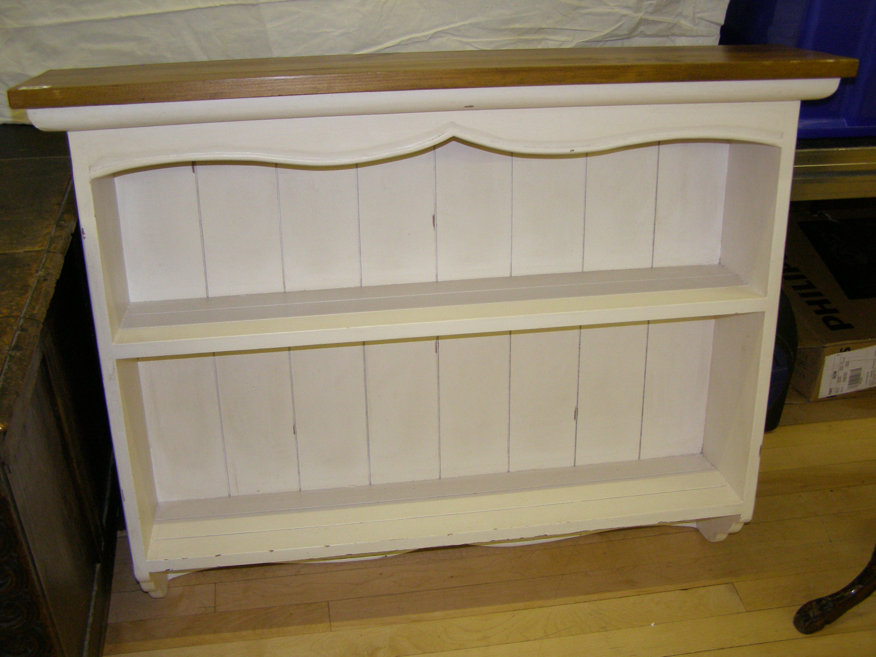 A white painted reproduction style wall cupboard