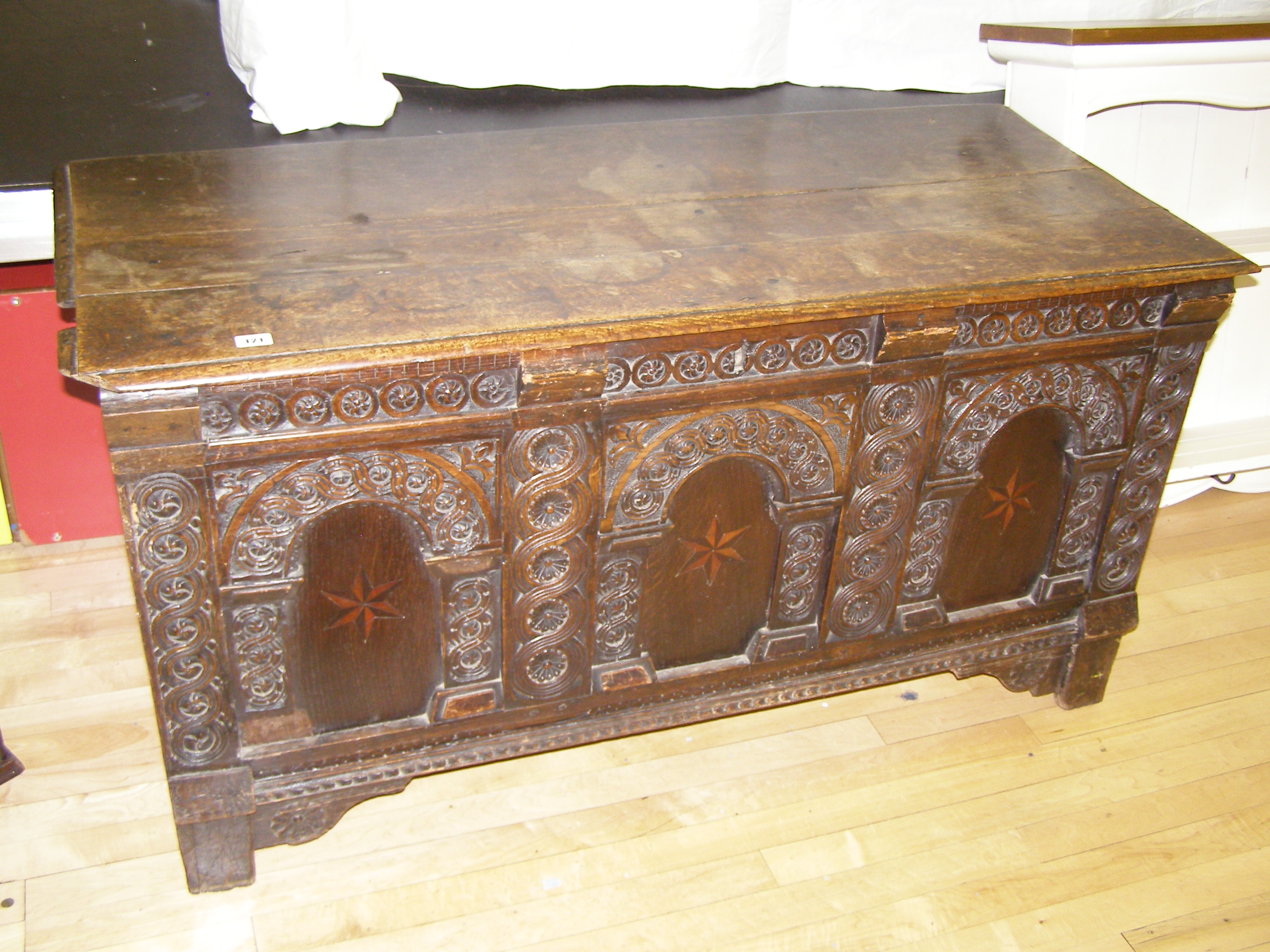 An antique style inlaid & carved oak coffer ? a/f