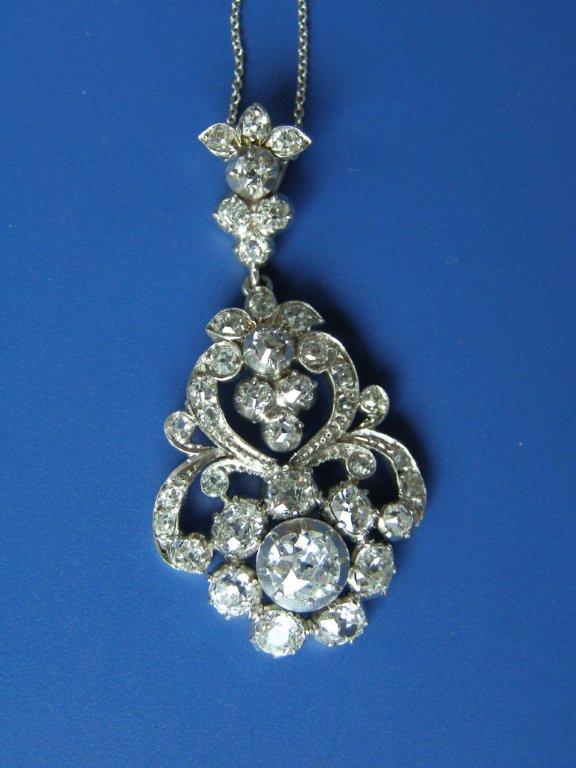 An old cut diamond swing pendant in white metal, 1.75?