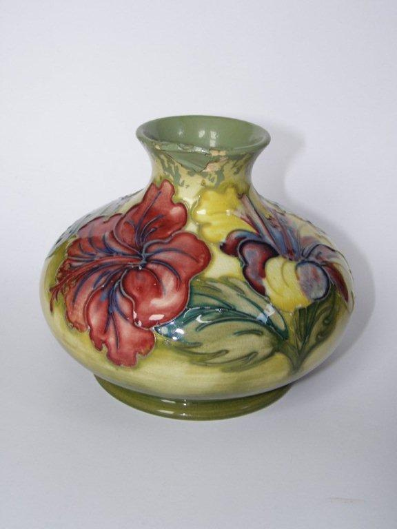 A  Walter Moorcroft Hibiscus pattern low vase ? with paper label `..Late Queen Mary`,  1953-78,  5?