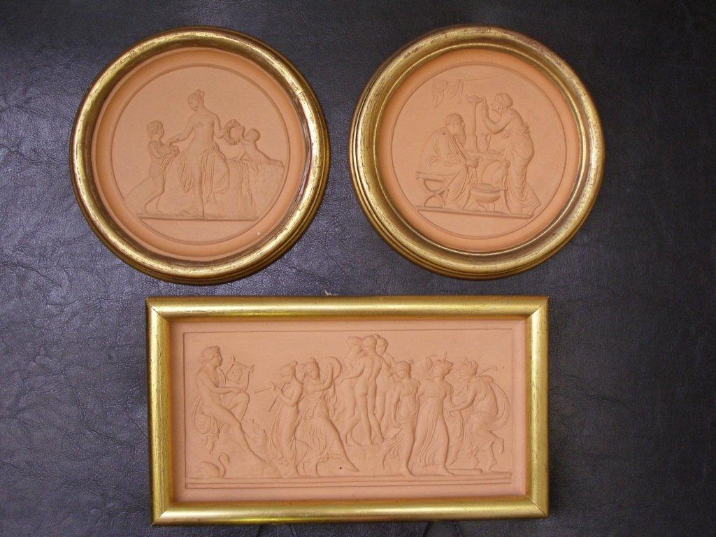 Three Danish terracotta plaques by P. Ipsen, Kjobenhavn, Eneret, decorated classical figures in low