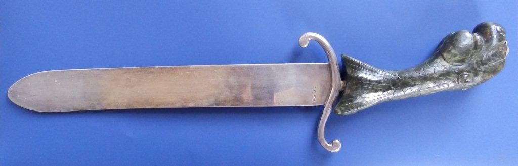 A Maltese silver letter opener, having spinach jade handle carved as a dolphin, , 15.5?