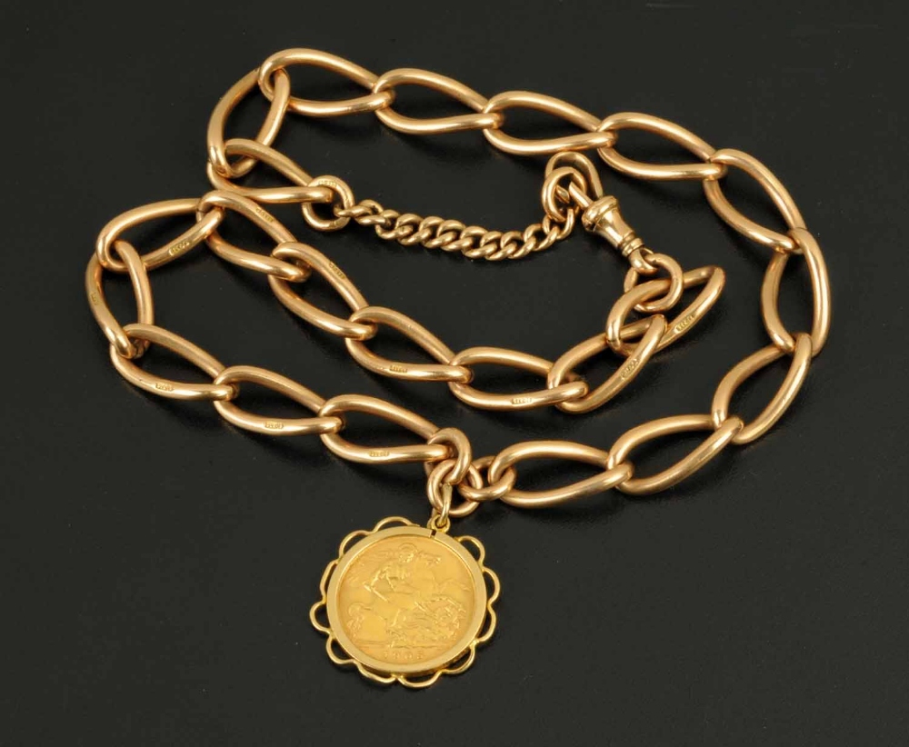 A 9 ct gold Albert chain, with Edwardian gold half sovereign mount, dated 1905.  Chain weight 47