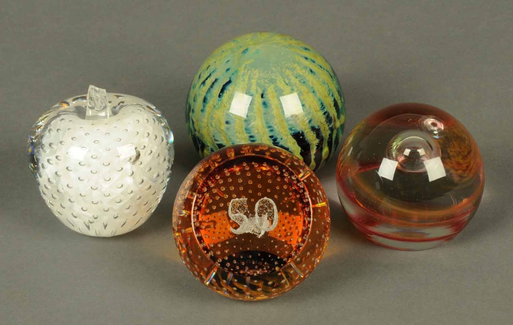 Four paperweights, Caithness 50, Caithness Whirlwind A27655, Mdina green swirl and Studio Lakeland.