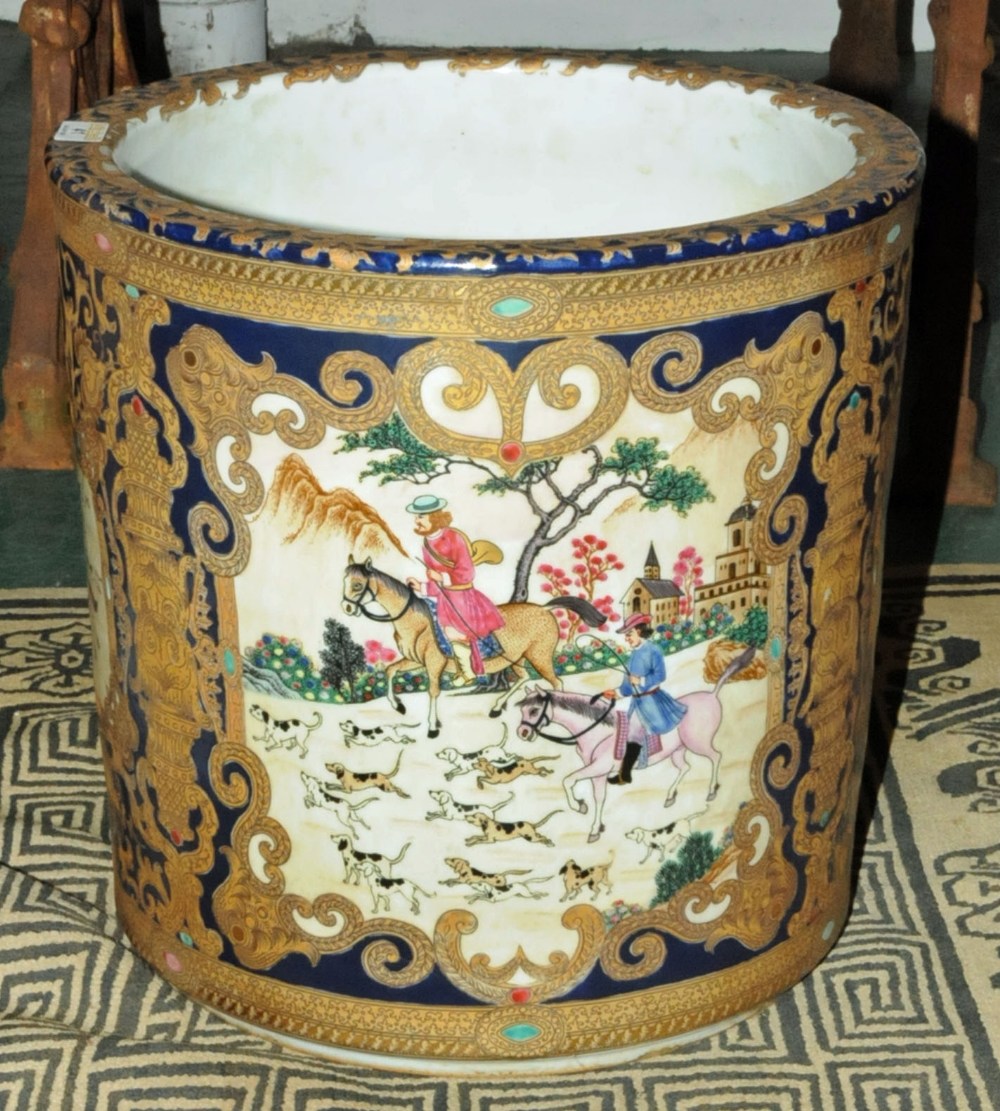 A large porcelain jardiniere, decorated with a huntsman and hounds.  Height 14.5 ins. - Image 2 of 7