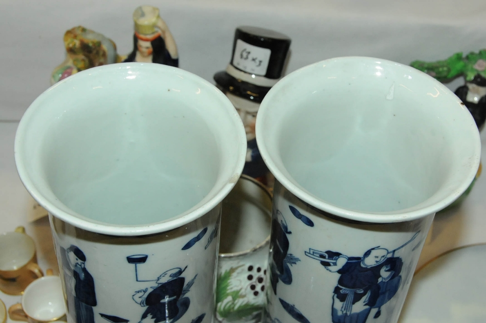 A pair of Chinese blue and white spill vases, decorated with figures, four character mark to - Image 4 of 5