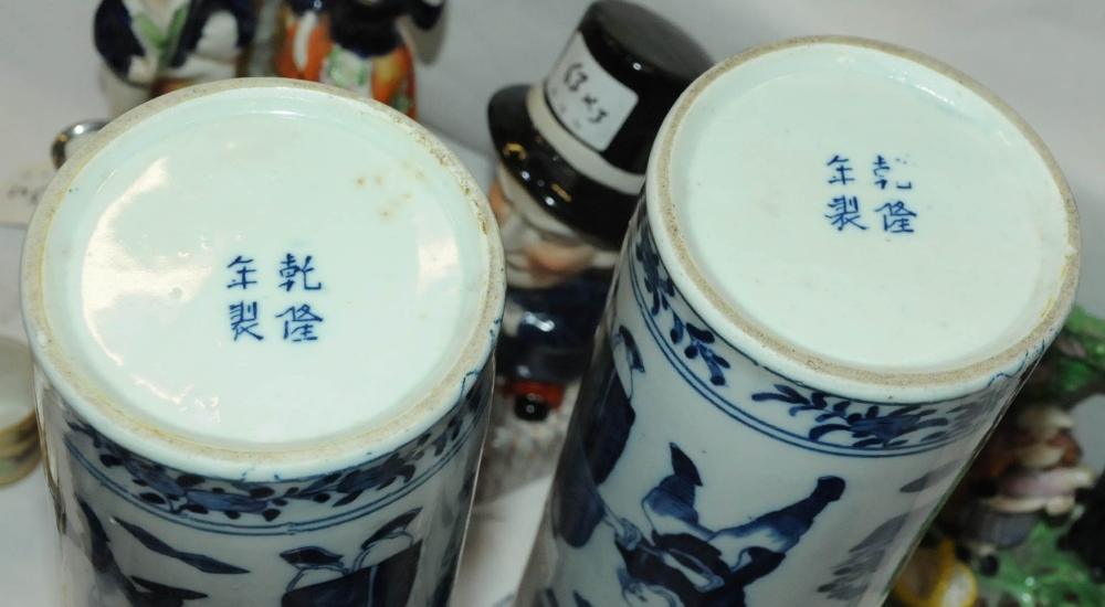 A pair of Chinese blue and white spill vases, decorated with figures, four character mark to - Image 5 of 5