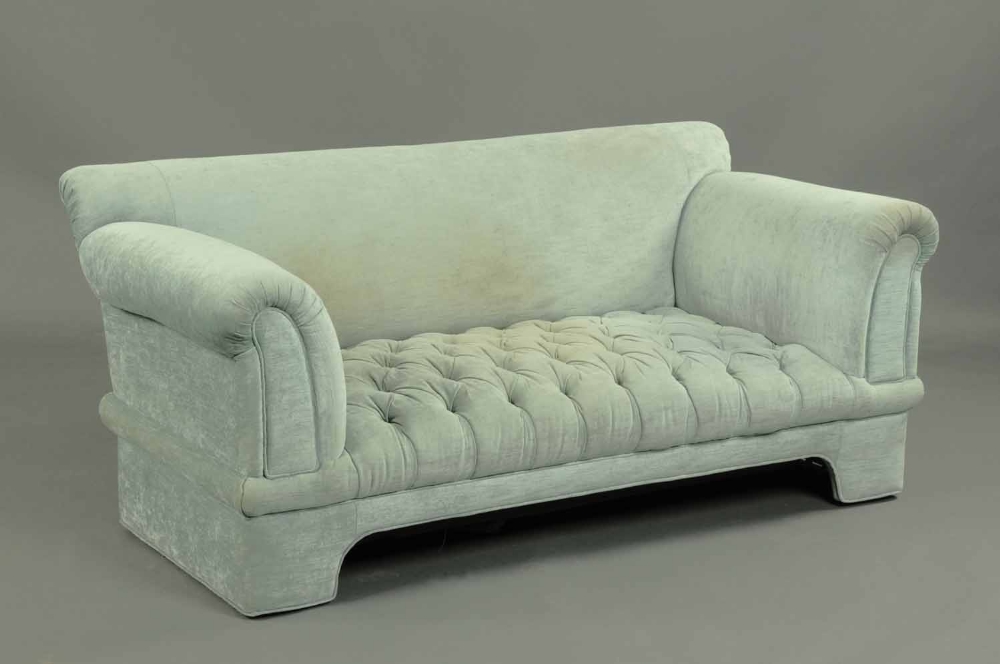 A mid-Victorian settee, with buttoned down seat upholstered in blue velvet type material.