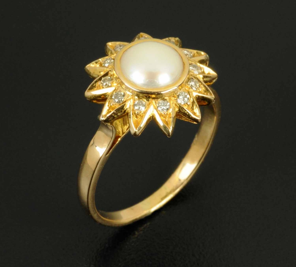 An 18 ct gold cultured pearl and diamond cluster ring, ring size O.