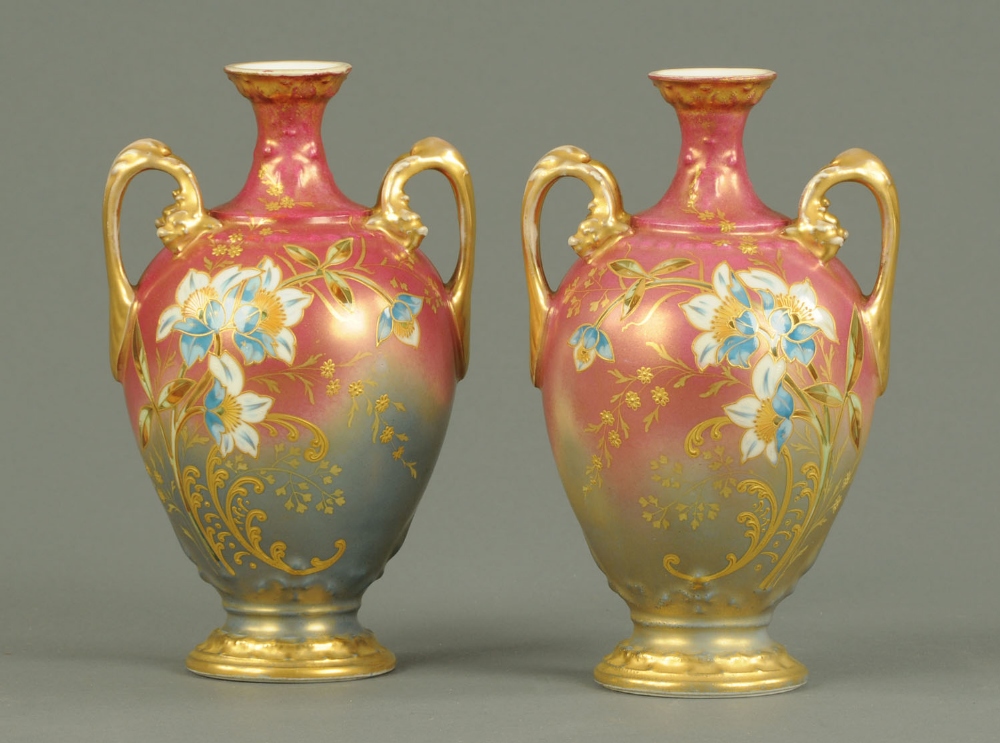 A pair of Limoges vases, enamelled, with printed marks to base.  Height 8 ins.