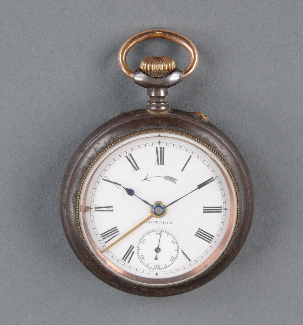 A Victorian gun metal alarm pocket watch, knob wind, open faced.  Diameter 56 mm.    CONDITION