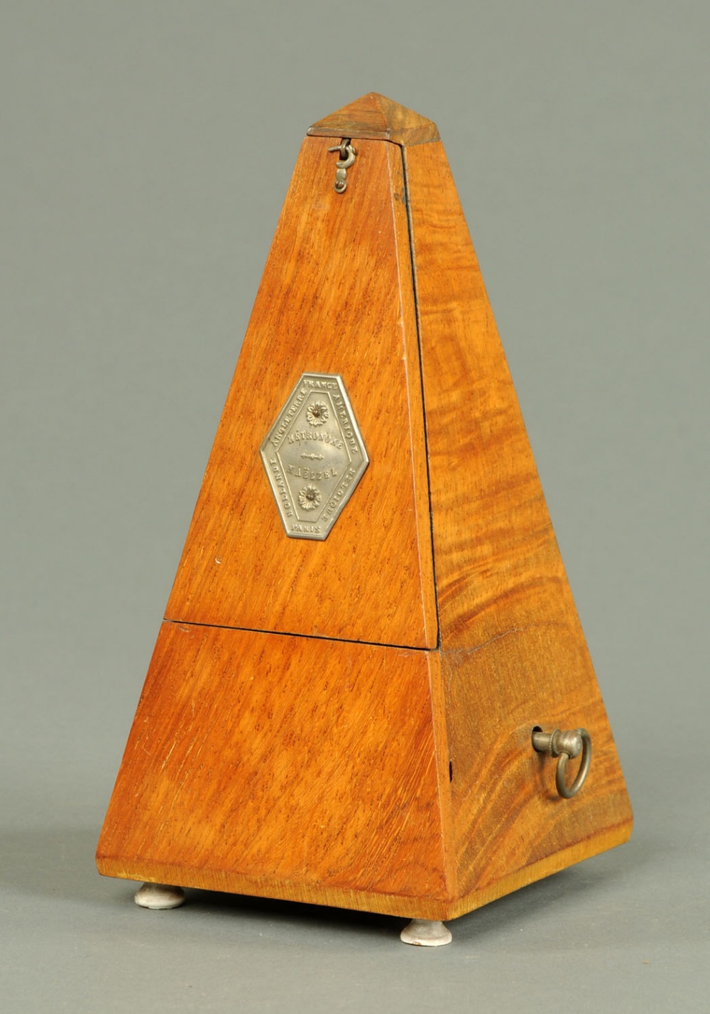 A French walnut cased metronome, by Maelzel.