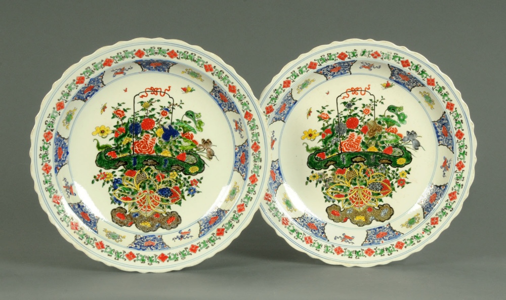 A pair of Chinese Famille Verte chargers, with Kangshi marks.  Diameter 18 ins (see illustration).