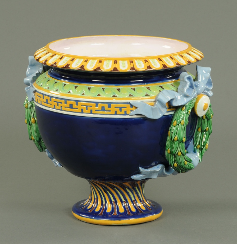 A Minton jardiniere, with pink interior and typical Majolica colours.  Diameter 14 ins (see