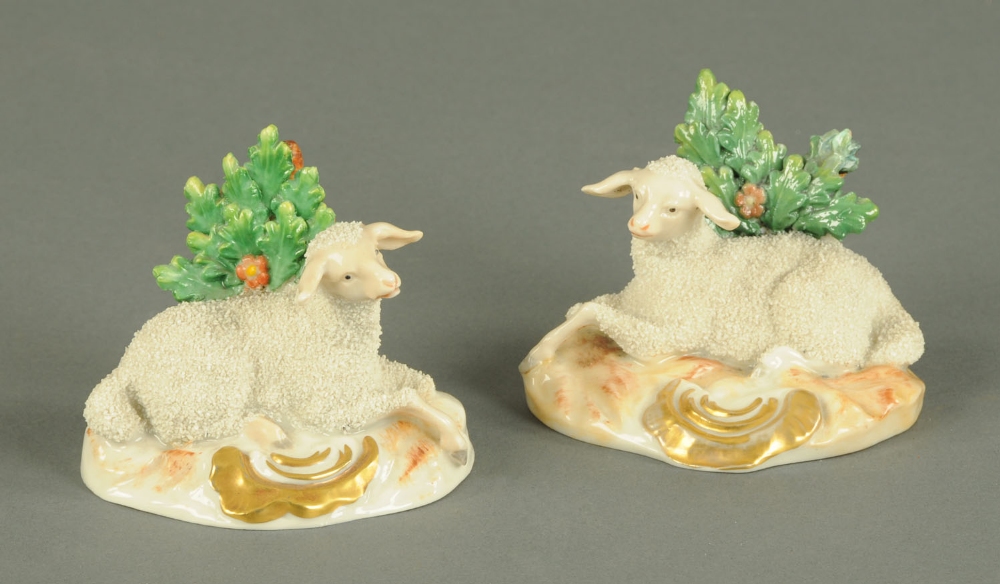 A pair of late 19th century recumbent sheep figures, each with bocage.  Length 4 ins.