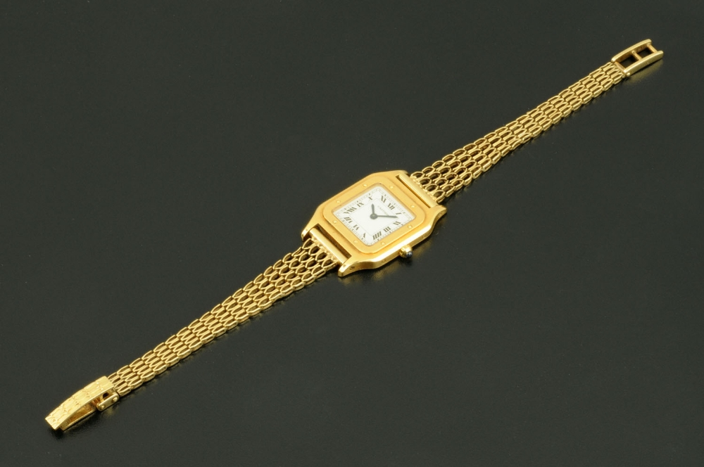 A Cartier ladies wristwatch, with square white dial with black Roman numerals in gold coloured metal