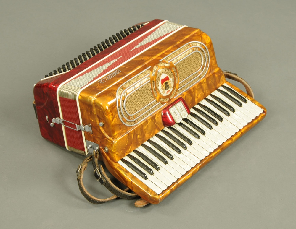 A piano accordion by Fontanella, 120 base.