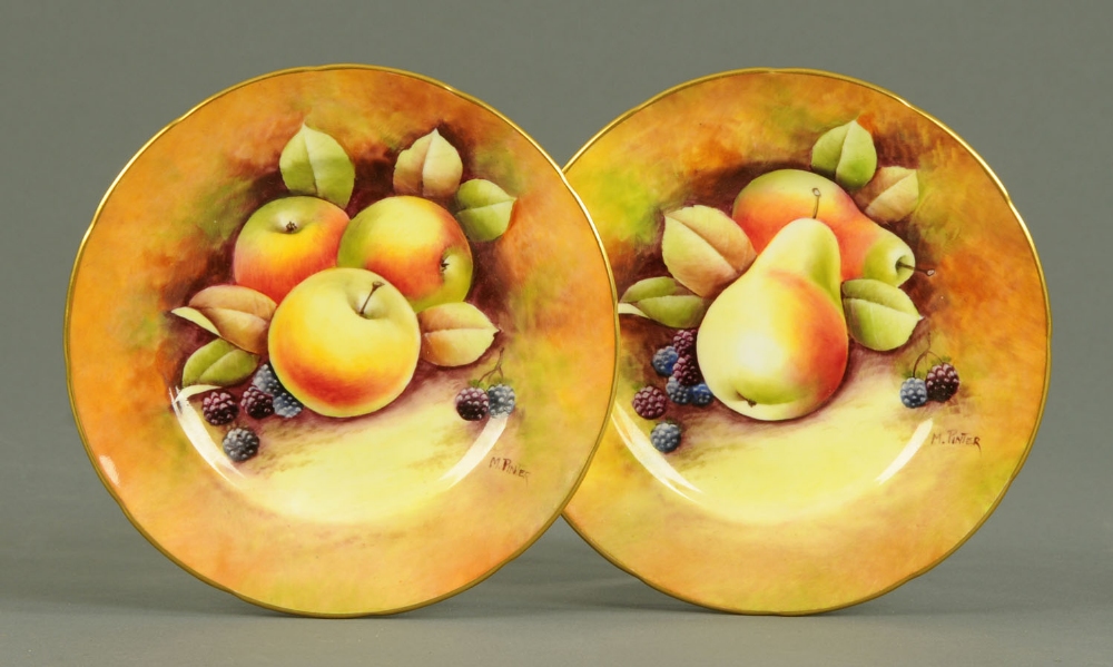 A pair of Coalport fruit plates, each signed "M. Pinter".  Diameter 6 ins.