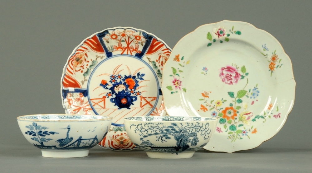 A 19th century Chinese polychrome plate, an Imari plate, each diameter 5 ins, and two Chinese blue