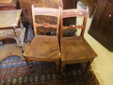 A pair of 19th Century elm and fruitwood bar back panel seat chairs, attributed to Norfolk circa