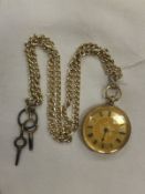A ladies 18 carat gold cased and engraved pocket watch with gold coloured chain